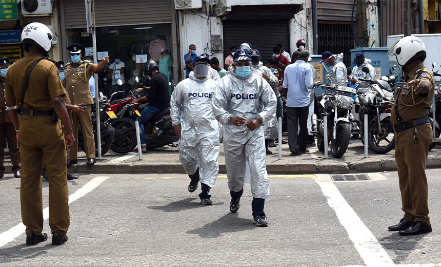 Sri Lankan police officers detain Chinese nationals suspected of running cybercrime operations